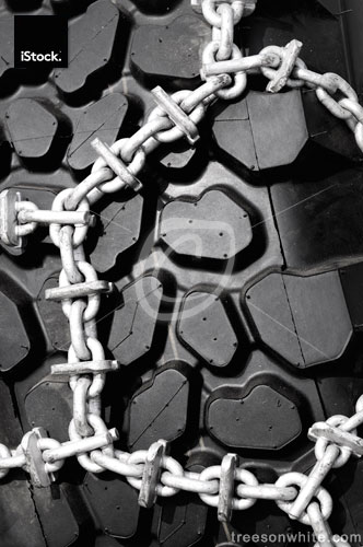 Snow chain close-up background.