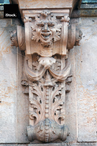 Baroque pillar with sculpture relief.