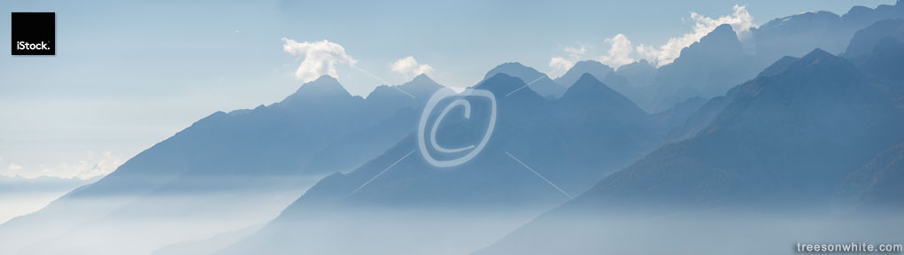 South Tyrol misty mountain peaks, panoramic image.