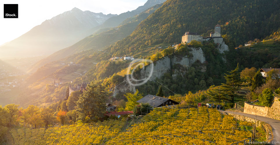 Castle Tyrol above the city of Merano (Italy) at sunset.