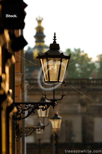 Lantern in Dresden Old Town with Zwinger background.