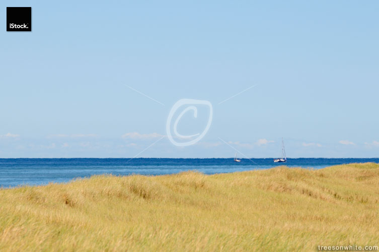 Baltic Sea, dunes, and a yacht.